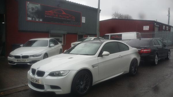 White BMW after bodywork and paint