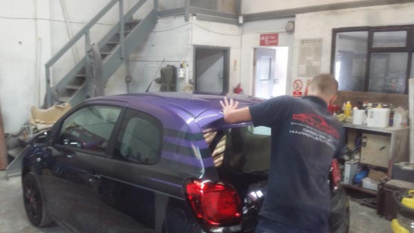 Car finished with custom painted stripes