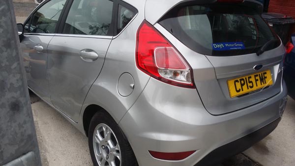 Silver Ford refinished to showroom condition